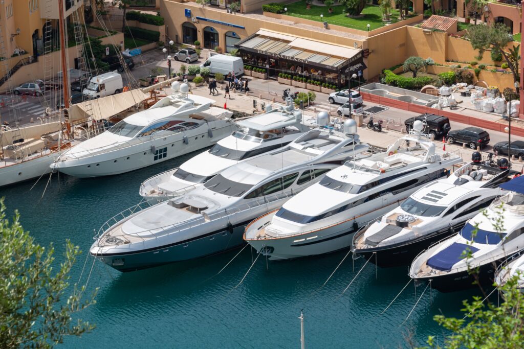 Luxury yachts moored in a Mediterranean marina in Monaco