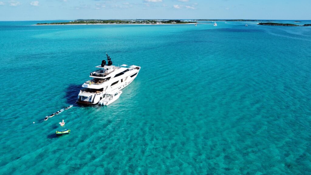 Luxury yacht AWAY anchored in the turquoise waters of the Exumas, Bahamas