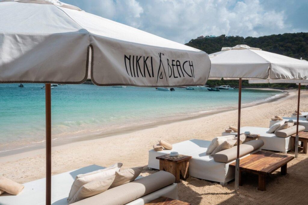Nikki Beach Saint Barth on St Jean Beach with white sunbeds and turquoise water