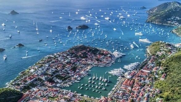 Superyachts anchored in Gustavia during a St Barths yacht charter